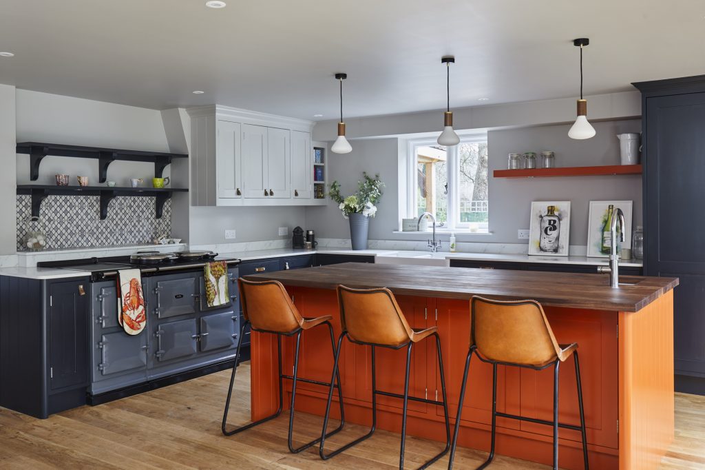 shaker style kitchen with orange island